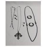 SILVER AND BLACK BEADED NECKLACE, EARINGS, AND CRO