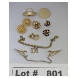 SCARF HOLDERS, EARINGS, BRACELET, AND JACKET/SWEAT