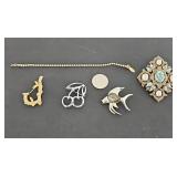 Sarah Coventry Brooches and Bracelet