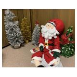 Large Santa Plush and Silver Gold Tinsel Trees