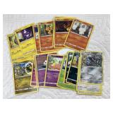 Large lot of assorted Pokemon cards in hard case.