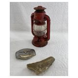 A lot with A dietz Railroad style lamp in need of