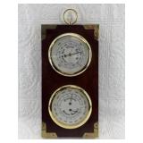 Wall hanging barometer/thermometer with brass boun