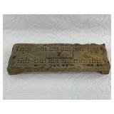 Soapstone cribbage board with pegs, intricately ca