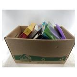 Box of office supplies: binders, folders, paper, p