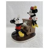 A Vintage Disney Official Porcelin Music box with