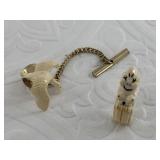 2 Small pieces of Alaskan jewelry: 2 tie tacs, goo