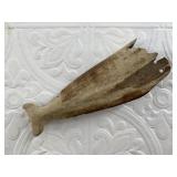 Remnants of an ancient Alaskan walrus ivory artifa