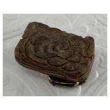 Antique ladies belt buckle with an interesting flo