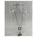 2 Modernist abstract pendants set on sterling silv