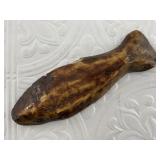 Ancient walrus ivory artifact, fish shaped.  This