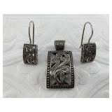 Stunning set of sterling silver jewelry with a bea