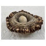 Moose antler base carved into a nest with small an
