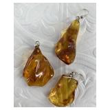 3 piece of amber jewelry: pendant, pair of matched