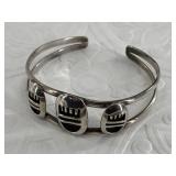 Sterling silver thin cuff bracelet, made by an Ind