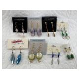 Lot with several new in package earrings