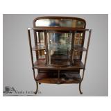 American Empire display cabinet with curved glass,
