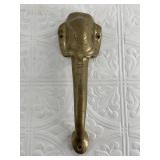 Solid brass door handle in shape of an elephant