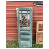 Vintage wood and glass shutter with beautifully we