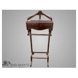 Wood  valet stand with place to hang clothes and p
