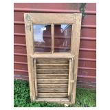 Vintage wood and glass shutter with beautifully we