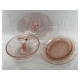 4 Pieces of pink Depression glass: 2 handled nut a