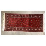 Hand woven Turkish rug/hall runner with rich red c