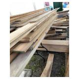 Lot of hardwood planks, some live edge, average le