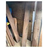 Teak board, relatively fine finish with some weath