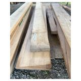 Stack of planks including birch and oak, average l