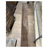 Teak board, relatively fine finish with some weath
