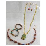 Lot with artisan glass necklace, natural stone wri