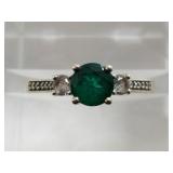 10kt Gold, diamond and emerald ring, central stone