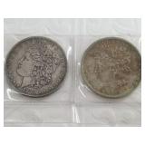 Two Morgan silver dollars, 1880 S and 1883
