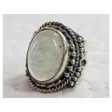 Ornate sterling silver ring with a quartz center s