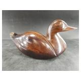 Ironwood carving of a duck without tail feathers