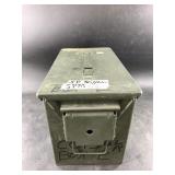 Large steel ammo can with small number of 12 ga bu