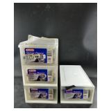 Set of 4 storage drawers, filled with goods: a pri