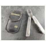 Leatherman Core multi-tool in sheath, knife seems