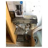 Table top vintage drill press, Delta, and a coffee