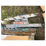 Lot with 4 long chainsaw extenders, longest is 46.