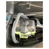 Poulan chain saw in a case with oil, sharpener, et