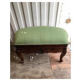 Lovely tufted ottoman, with a thick green cushion,