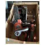 Box lot of B&D tools: 2 chain saws, batteries and