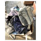Large mixed lot with clothing, shop towels, bean b