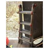 Extendable Little Giant ladder and a small tarp  N