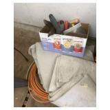 Lot with concrete trowels, canvas drop cloths, 2 l
