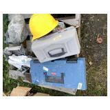 Several tool boxes some filled with tools and fast