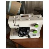 Smarter by Pfaff sewing machine with several bobbi