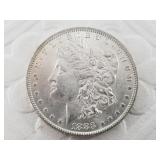 1883 O Morgan silver dollar  AU58 or better